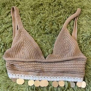 Tan crochet crop top with circle tassels, buttons in the back